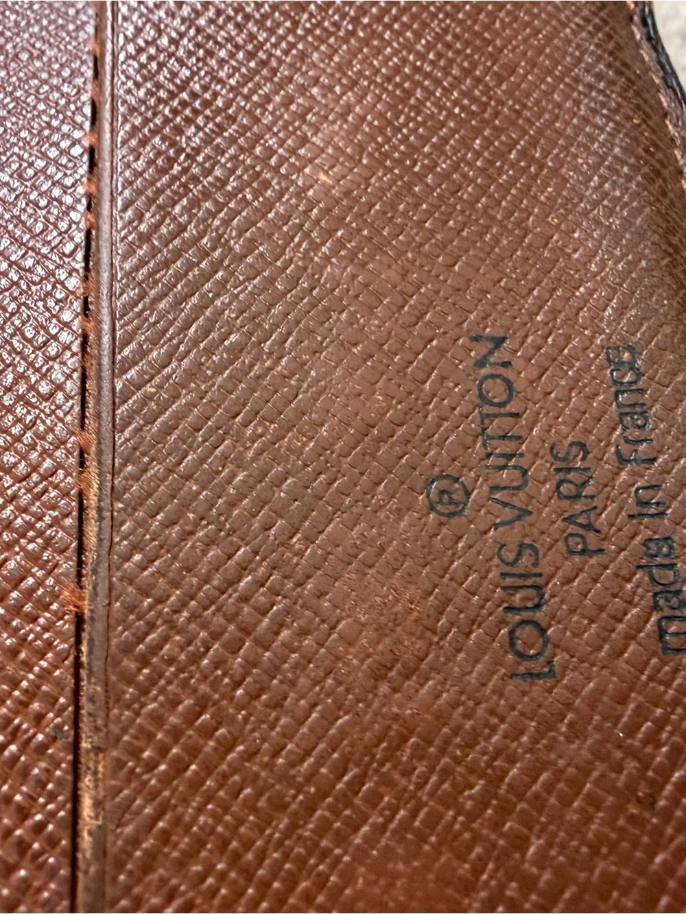 Louis Vuitton Men's Monogram Bi-Fold Wallet in Brown